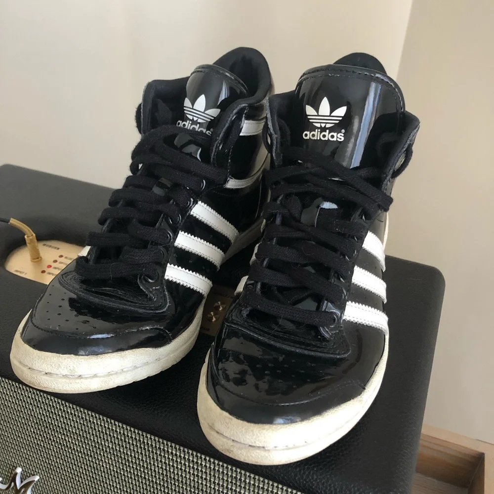 adidas Black and White High-Top Athletic Shoes